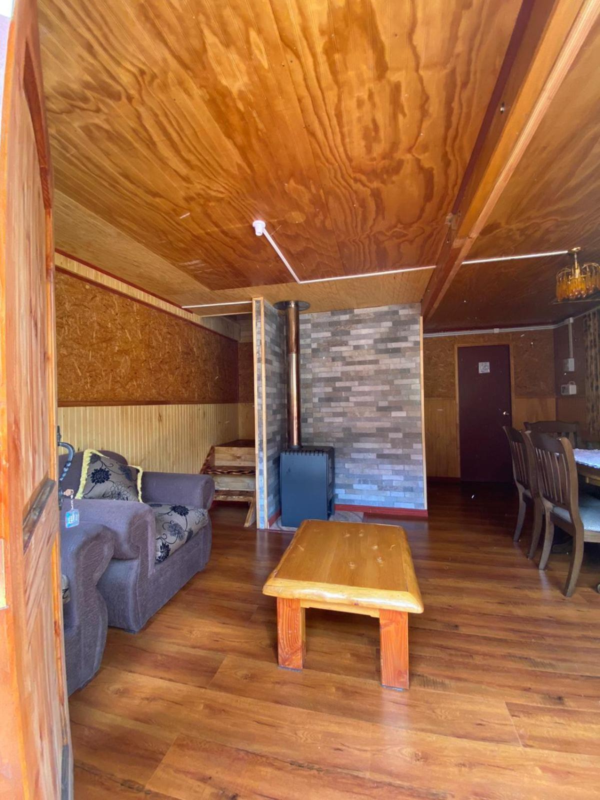 Cabanas Robinson Puerto Puyuguapi Rum bild